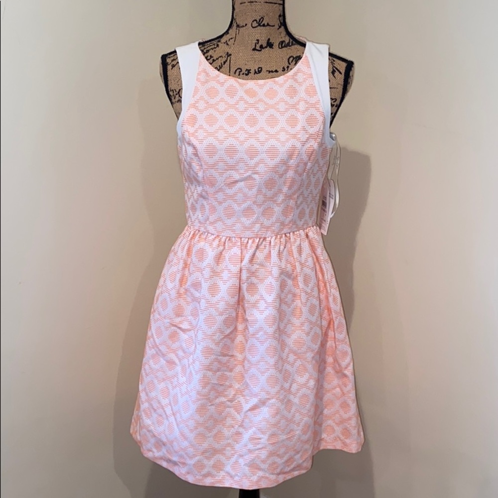 Jessica Simpson coral and white dress.